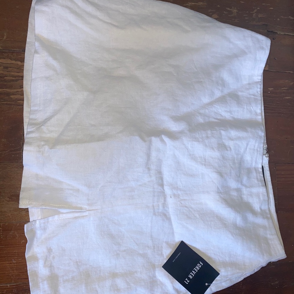 White skirt with small leg slit